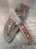 4" blade, 8" 1/4 overall length full tang, Damascus with Rosewood handle
