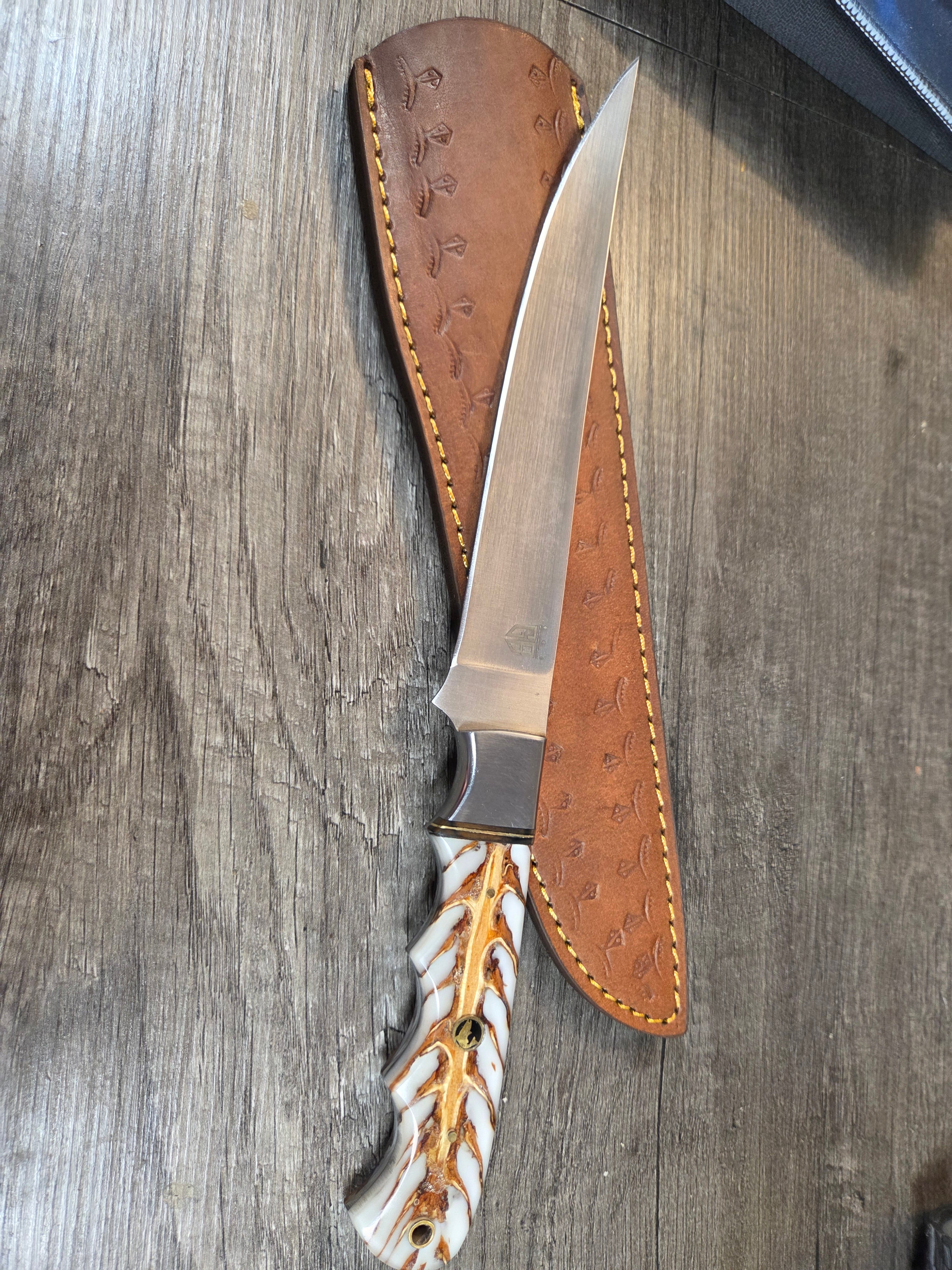 8" blade Swedish steel with pinecone handle