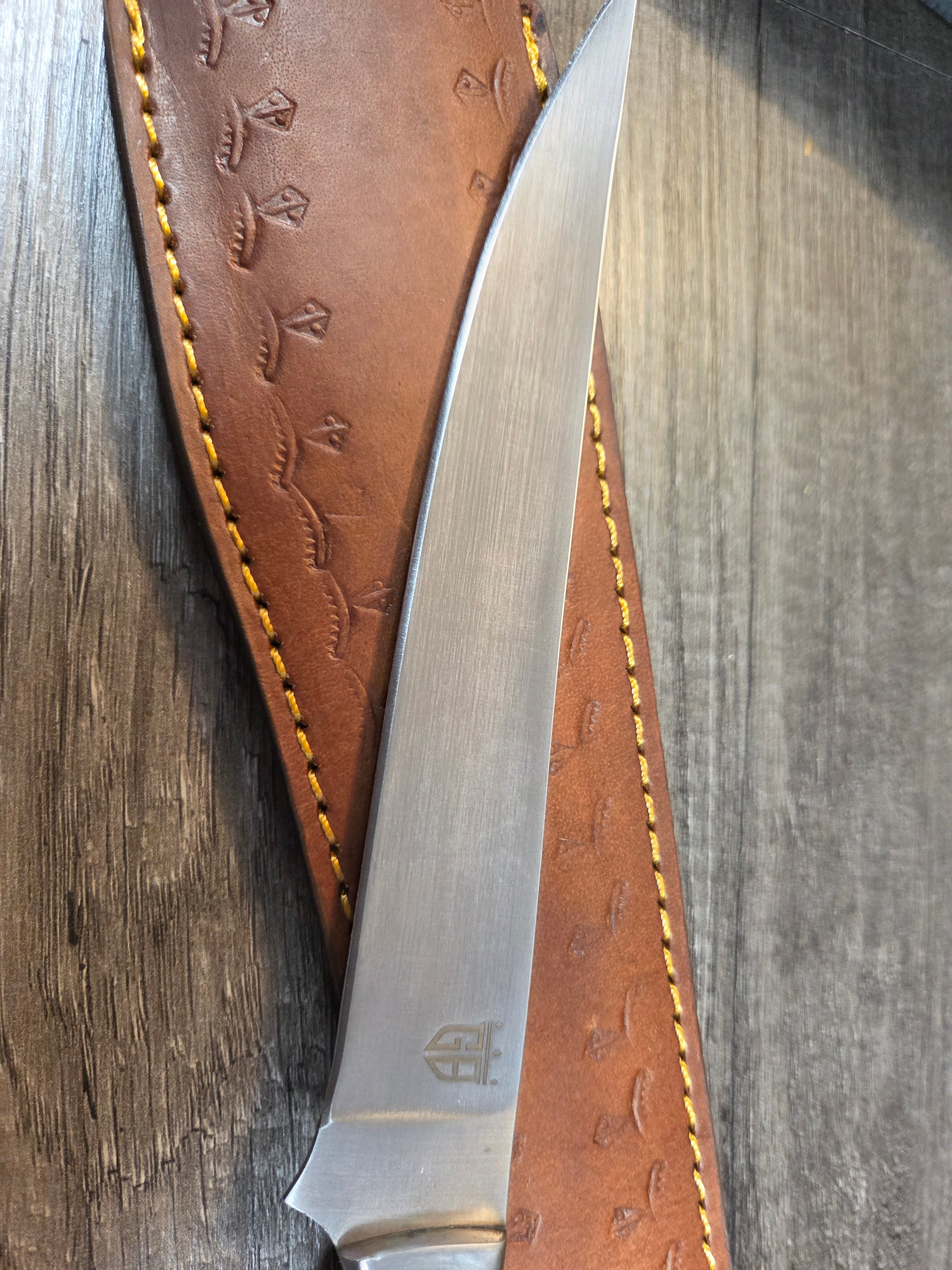 8" blade Swedish steel with pinecone handle