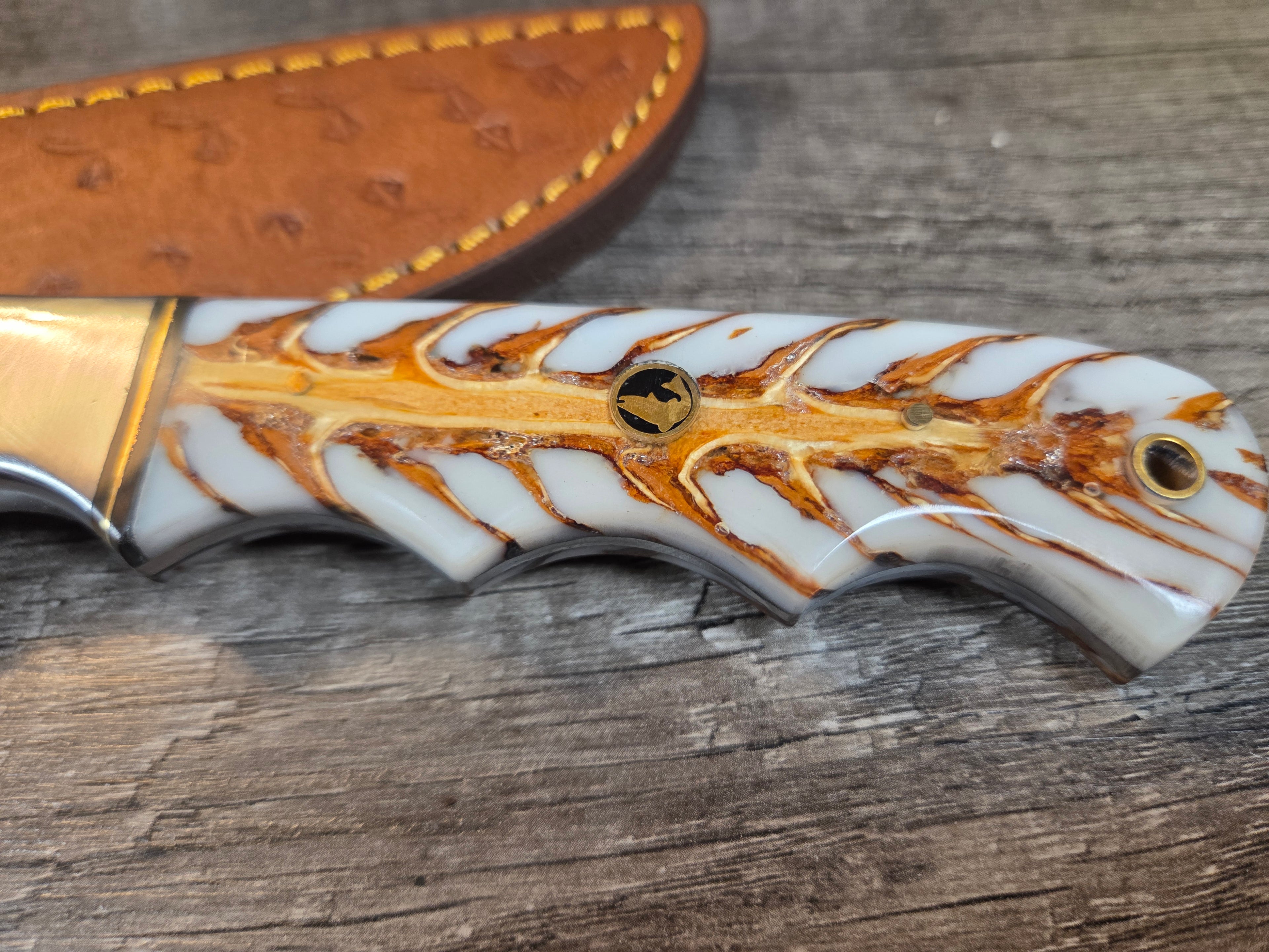 8" blade Swedish steel with pinecone handle