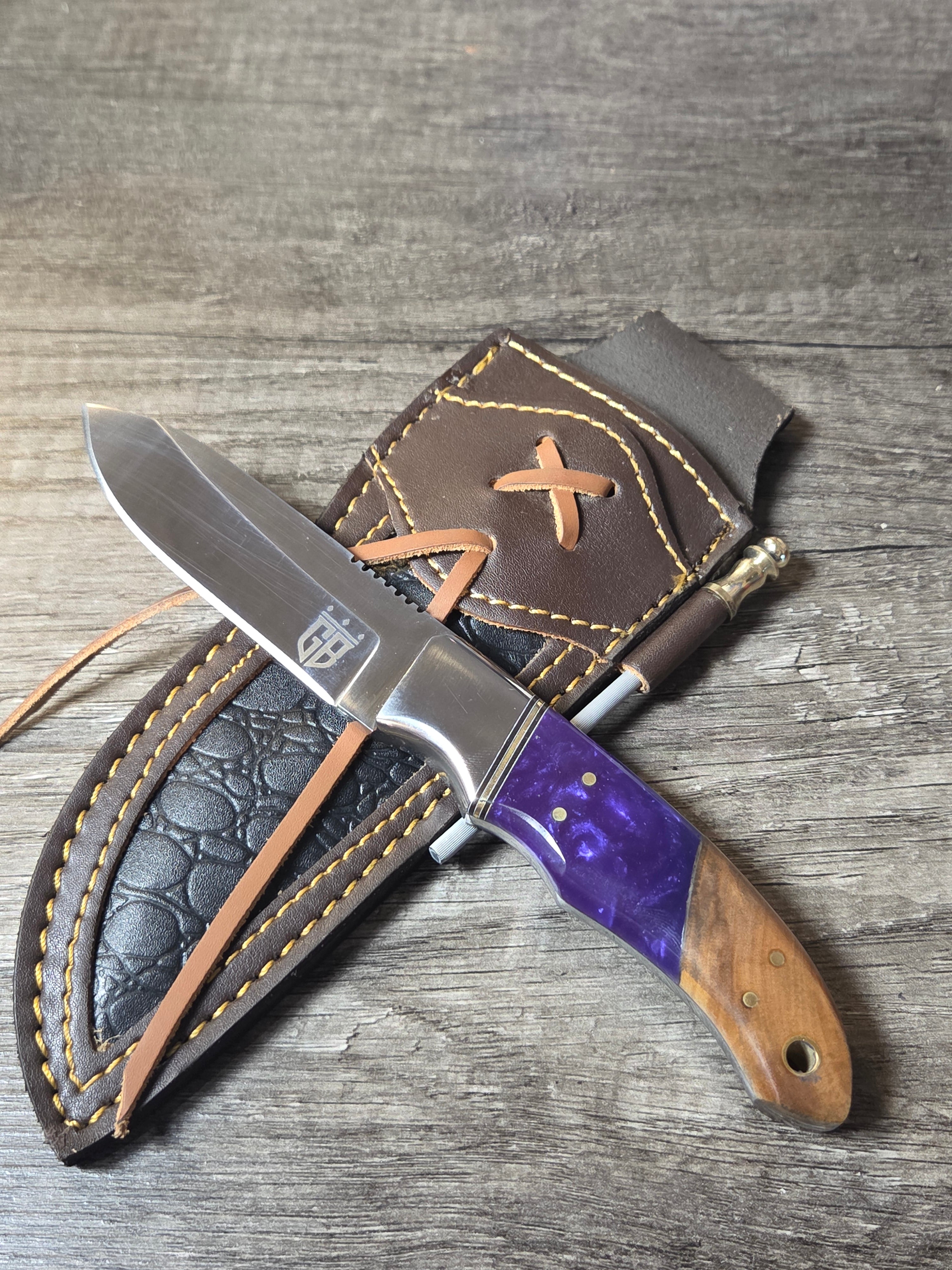 Swedish steel, resin/walnut handle