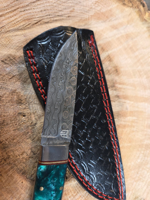 3 5/8" blade raindrop Damascus with green resin/walnut handle