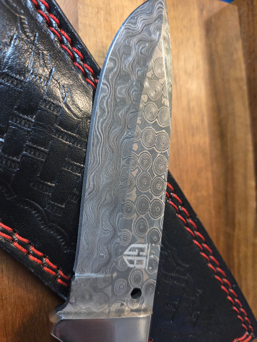 9 1/4 inch Raindrop Damascus, rosewood handle